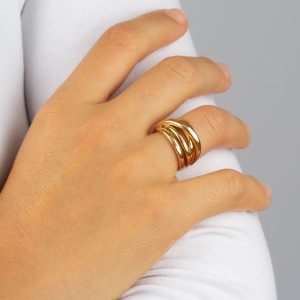 Anillo Acabado en Oro de 18Kt cinco tiras cruzadas
